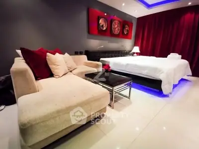 Luxurious bedroom with modern decor and ambient lighting