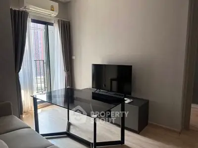 Modern living room with sleek furniture and natural light