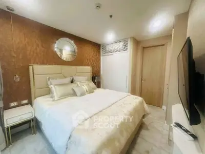 Luxurious bedroom with elegant decor and plush bedding in modern apartment
