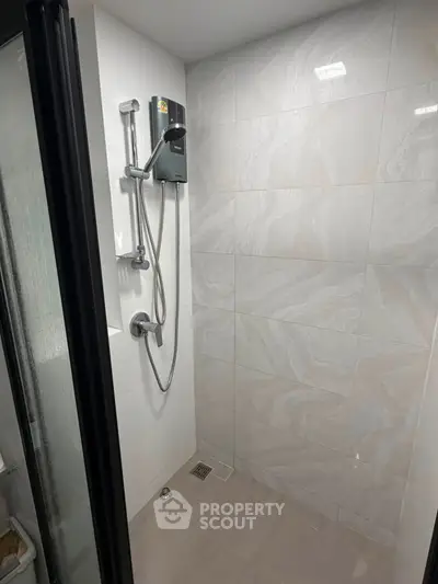 Modern bathroom with sleek shower design and elegant tile work