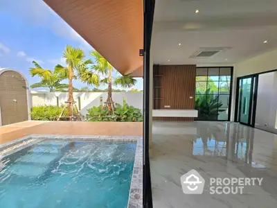 Luxurious modern home with private pool and spacious living area, perfect for relaxation and entertainment.