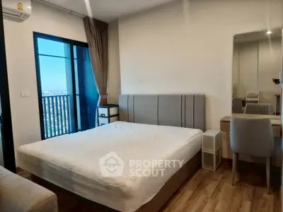 Modern bedroom with balcony view in stylish apartment