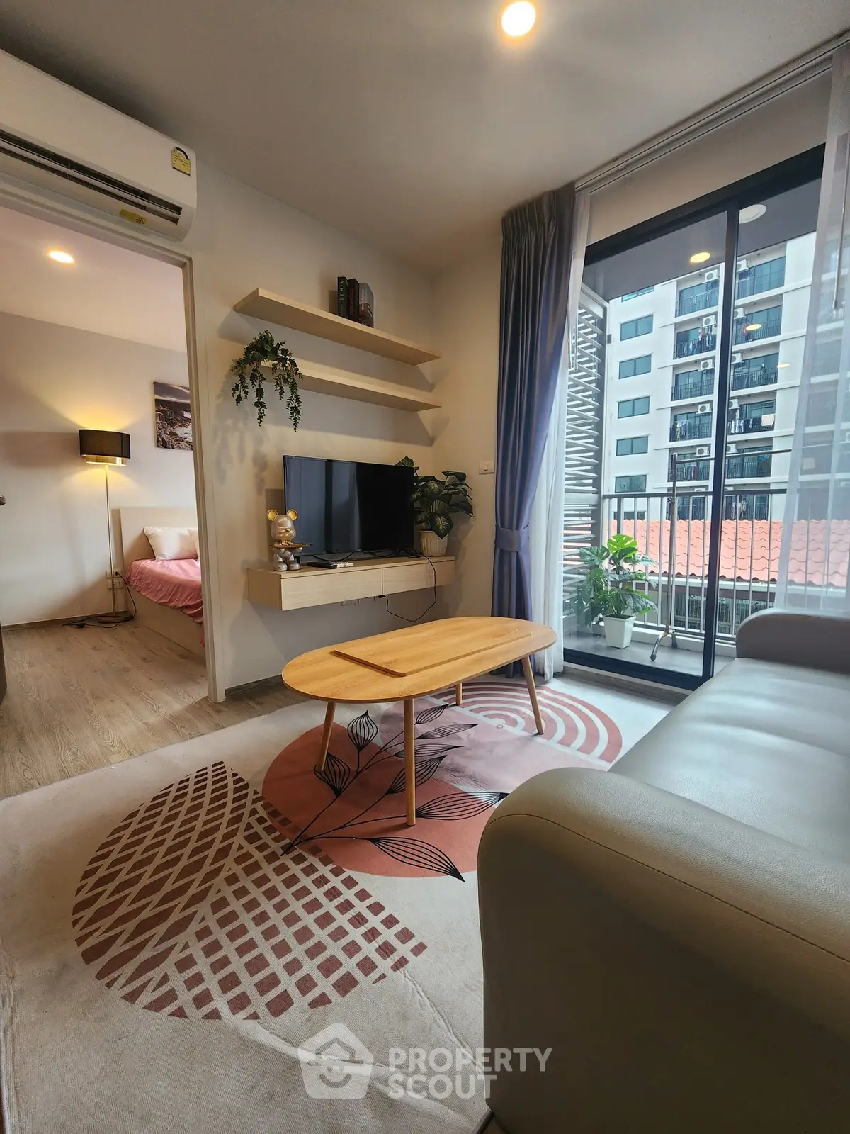 Modern living room with balcony view in stylish apartment
