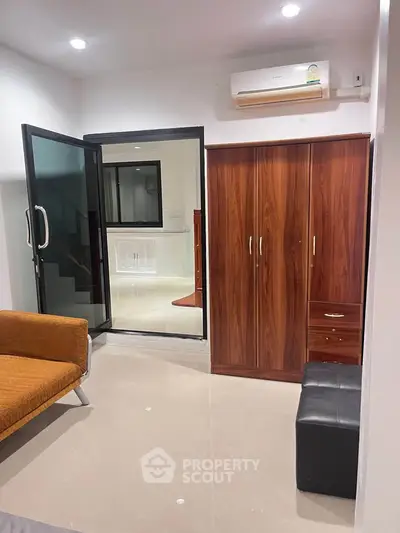 Modern interior with sleek furniture and air conditioning in a cozy living space.