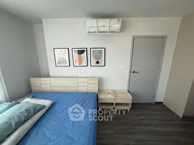 Modern bedroom with stylish decor and air conditioning