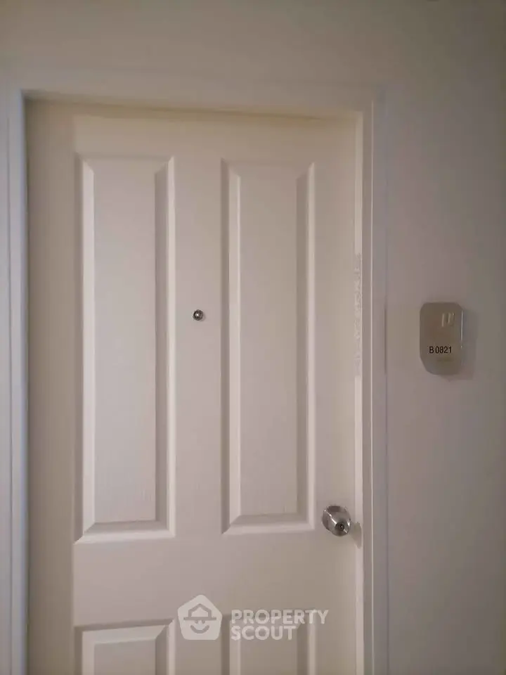 Apartment door with room number B0821, simple and elegant design.
