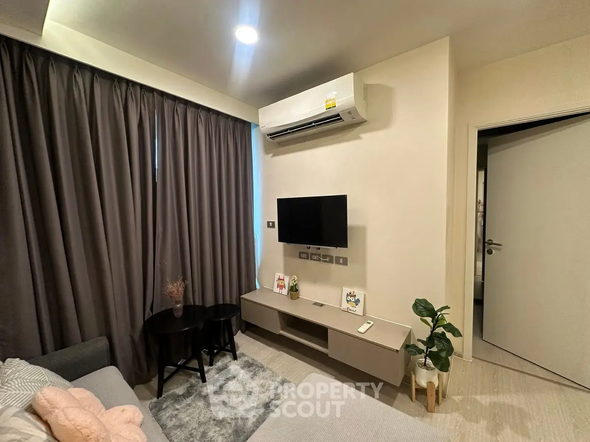 Modern living room with air conditioning and stylish decor