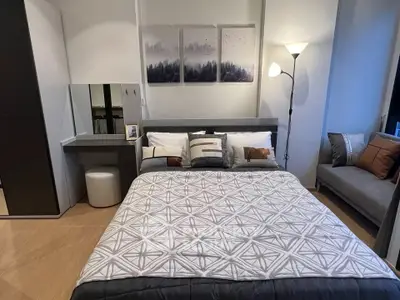 Modern bedroom with stylish decor and cozy ambiance