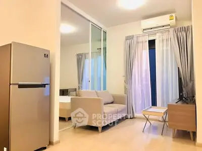 Modern apartment interior with cozy living room and bedroom, featuring sleek furniture and natural light.