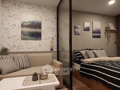 Stylish studio apartment with cozy living area and modern decor