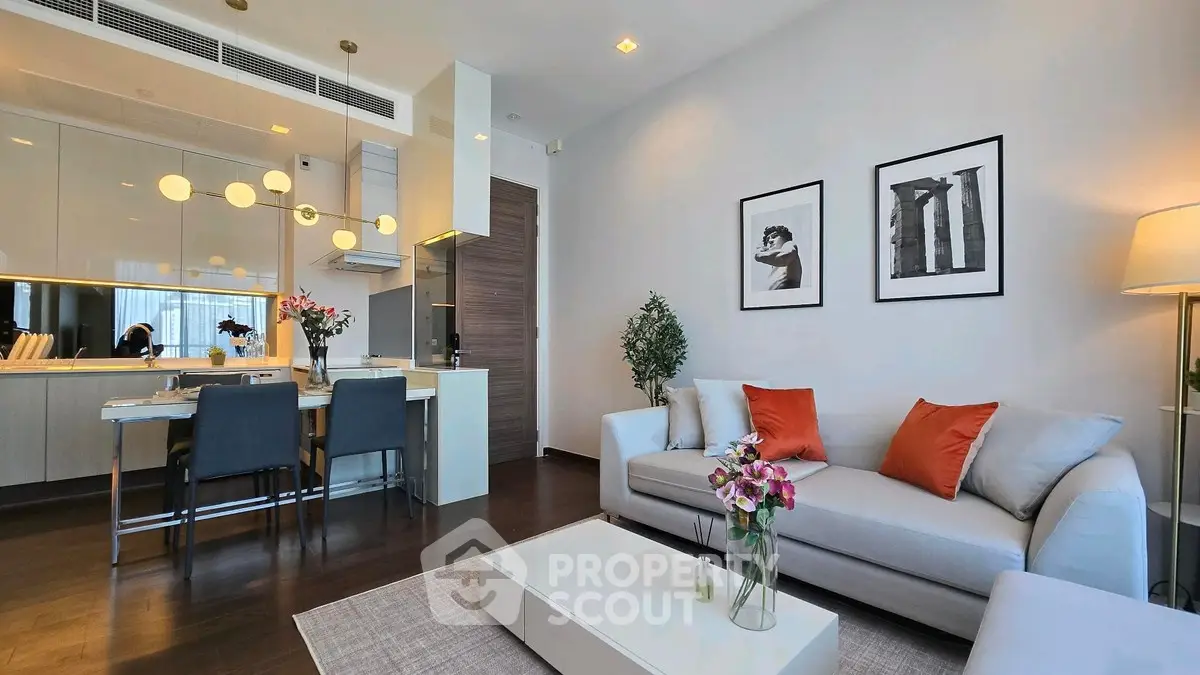 Modern living room with stylish decor and open kitchen layout