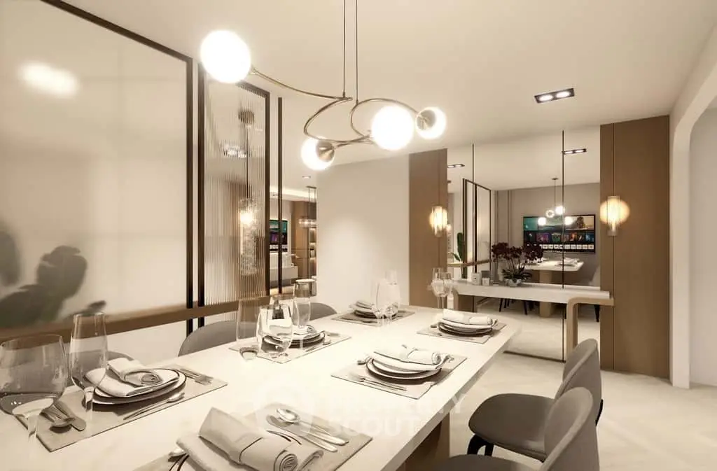 Luxurious dining room with elegant table setting and modern lighting in a contemporary home.