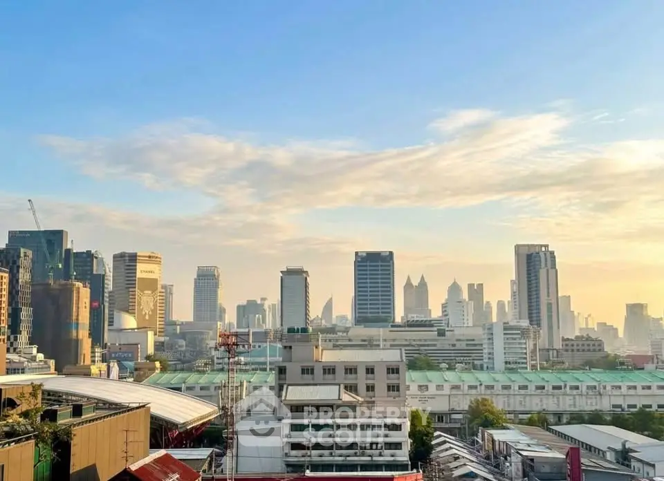 Stunning city skyline view with modern skyscrapers at sunrise, perfect for urban living enthusiasts.