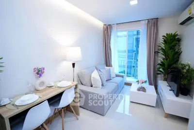 Modern living room with cozy sofa, dining area, and large window view.