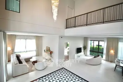 Spacious modern living room with high ceilings and elegant decor