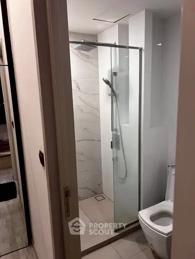 Modern bathroom with glass shower and sleek design