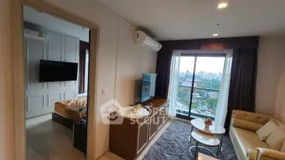 Modern living room with balcony view in a stylish apartment