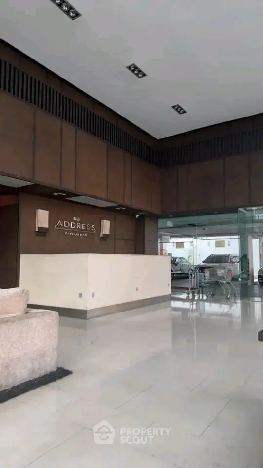 Luxurious building entrance with modern design and elegant decor