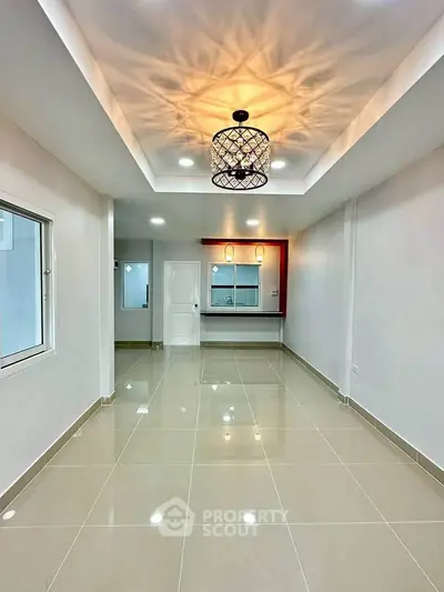 Modern interior with elegant lighting and glossy tiled flooring