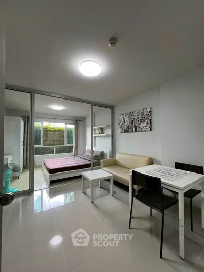 Modern studio apartment with open layout and stylish furnishings