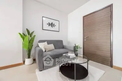 Modern living room with cozy gray sofa and stylish decor