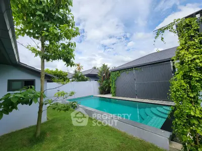 Stunning modern home with private pool and lush garden, perfect for relaxation and entertaining.