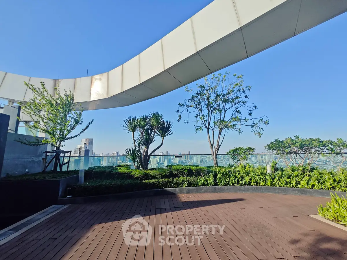 Stunning rooftop garden with panoramic city views and modern design.