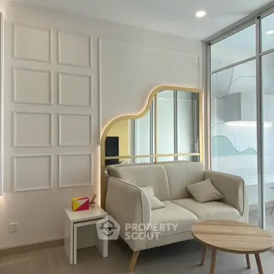 Stylish modern living room with elegant sofa and unique wall design