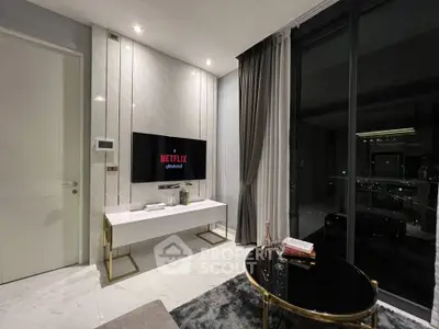 Luxurious modern living room with sleek design and large window view.