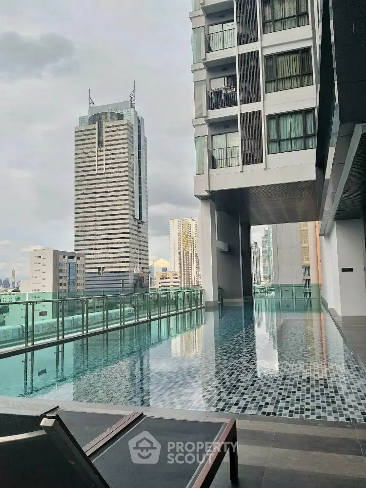 Luxurious rooftop pool with stunning city skyline view in modern high-rise building