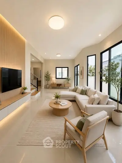 Spacious modern living room with elegant decor and natural light