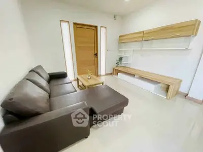 Modern living room with sleek furniture and minimalist design, perfect for contemporary living.
