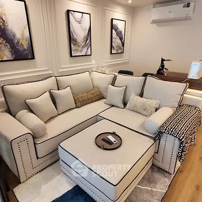 Elegant living room with plush sectional sofa and modern decor