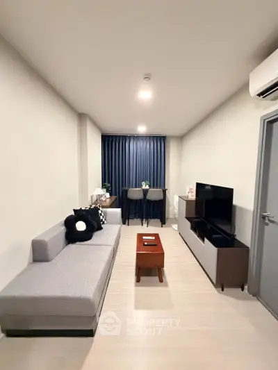 Modern living room with sleek furniture and stylish decor