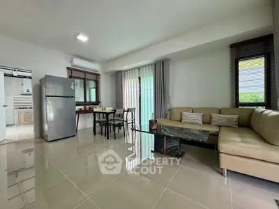 Spacious modern living room with sleek furniture and open layout