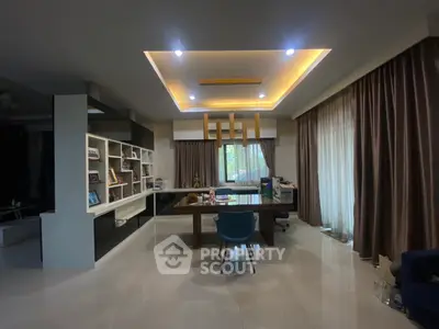 Spacious modern study room with elegant lighting and large windows