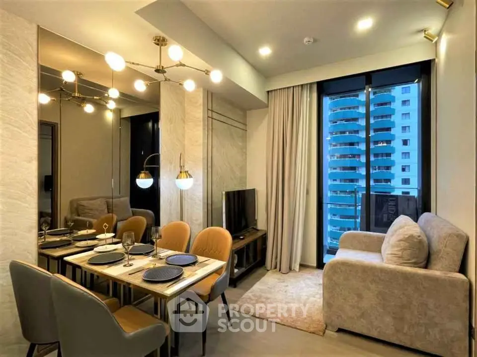 Modern living room with dining area and city view, featuring elegant lighting and cozy seating.