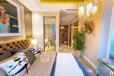 Luxurious bedroom with elegant decor and ambient lighting, featuring plush bedding and stylish wall art.