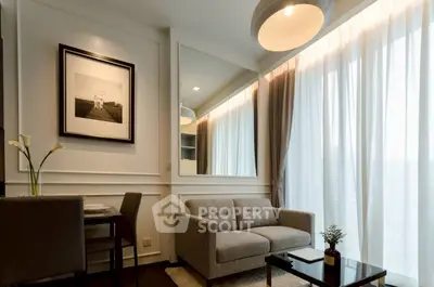 Modern living room with elegant decor and large window drapes