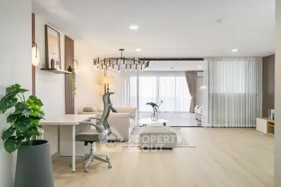 Spacious modern living room with elegant decor and natural light