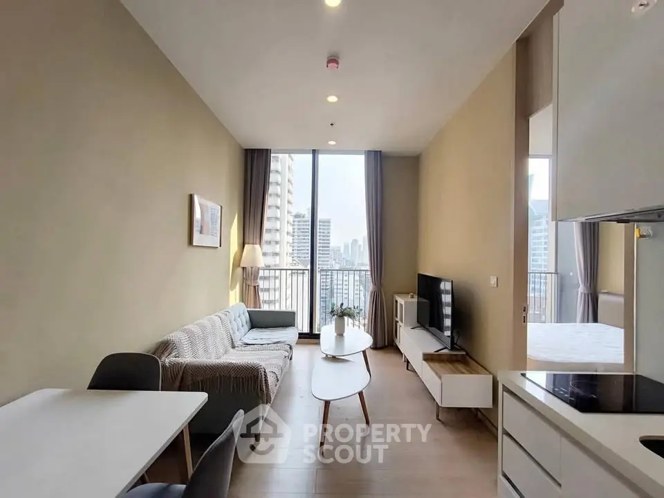 Modern living room with city view, stylish furniture, and open layout in urban apartment.