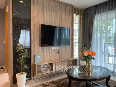 Modern living room with wall-mounted TV and elegant decor