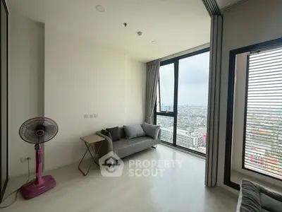 Modern living room with panoramic city view and minimalist decor