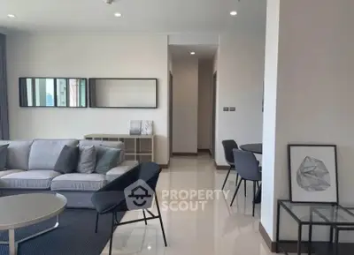 Modern living room with sleek furniture and stylish decor in a contemporary apartment.