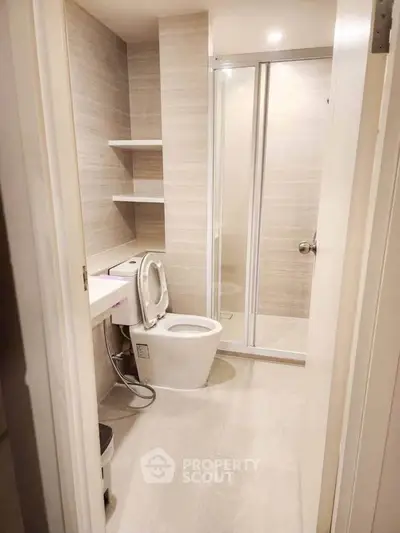Modern bathroom with sleek design and glass shower enclosure