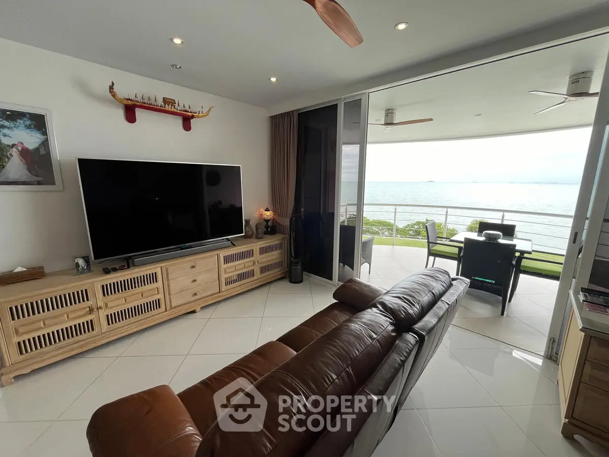 Luxurious living room with ocean view and spacious balcony