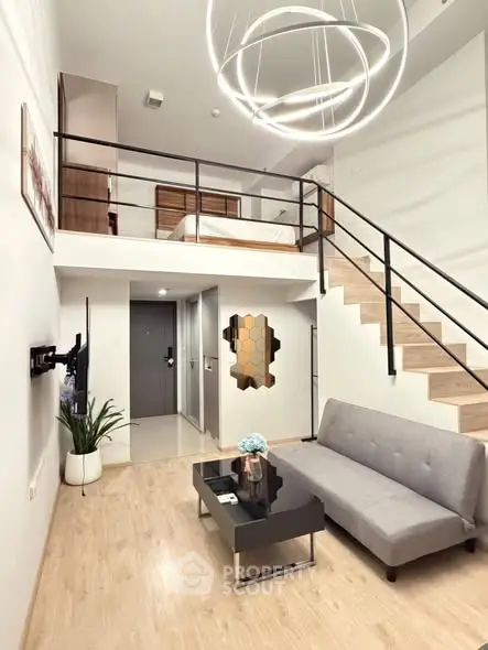 Modern loft apartment with stylish lighting and open staircase