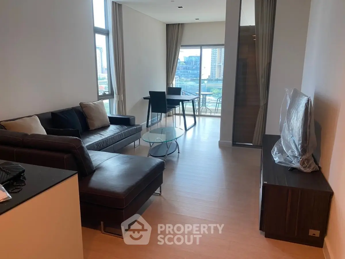 Modern living room with city view and stylish furniture