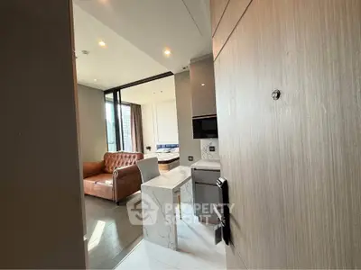 Modern open-plan living room with stylish furniture and natural light