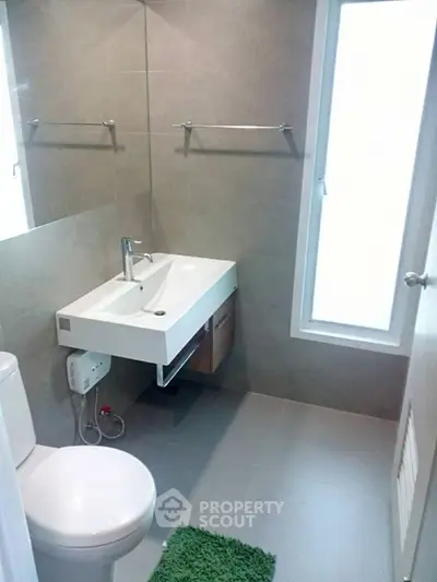 Modern bathroom with sleek fixtures and natural light